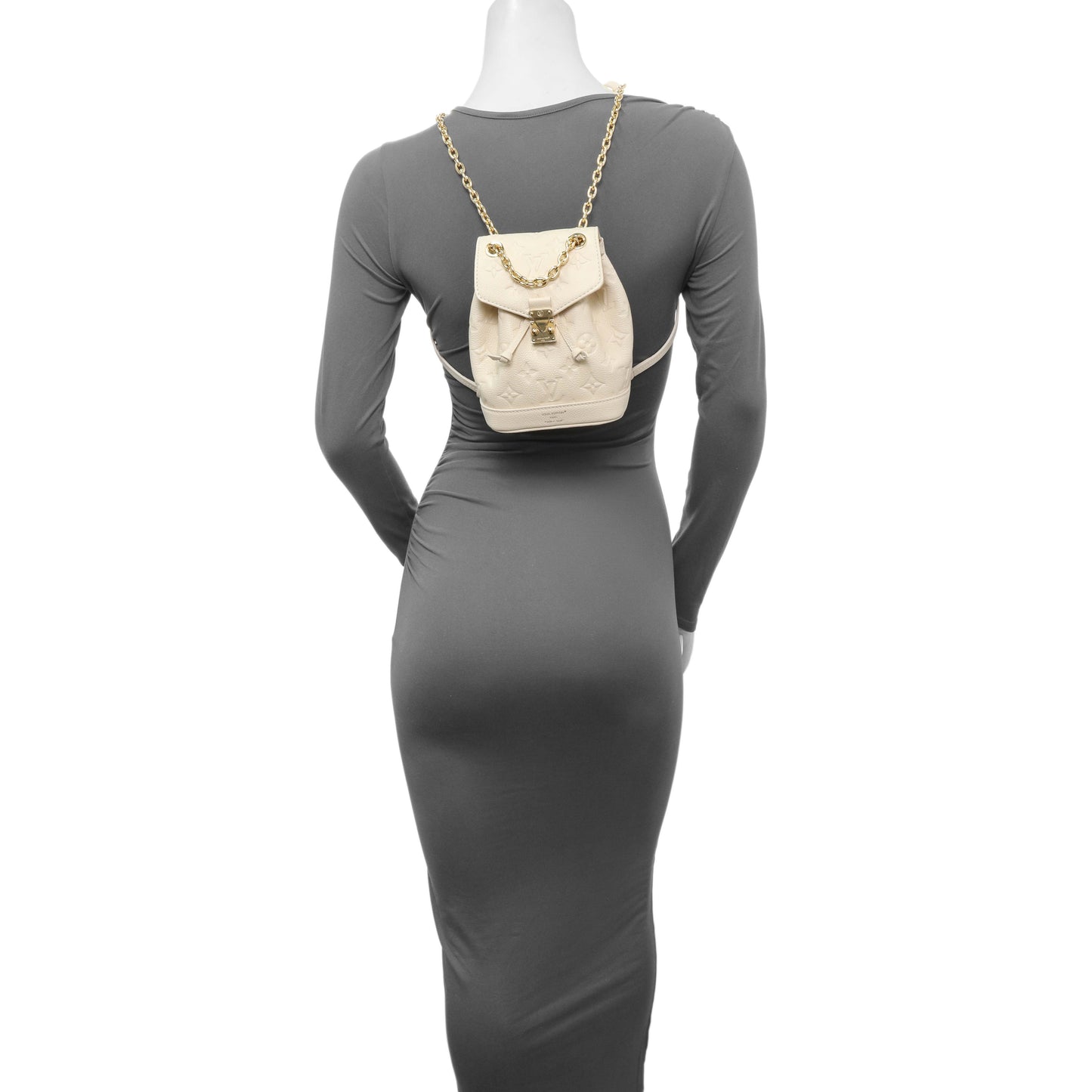 Exclusive Louis Vuitton Cream Empreinte Nano Noe Backpack — Lifestyle View
