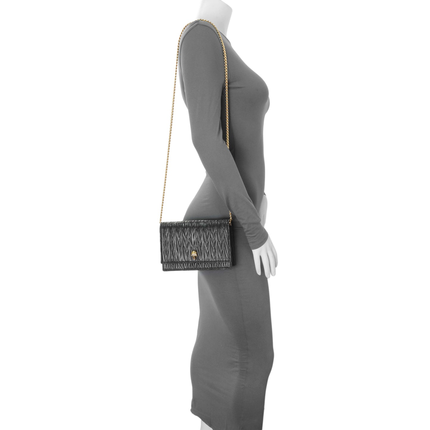 Exclusive Alexander McQueen Black Pleated Skull Mini Crossbody Bag — Lifestyle View