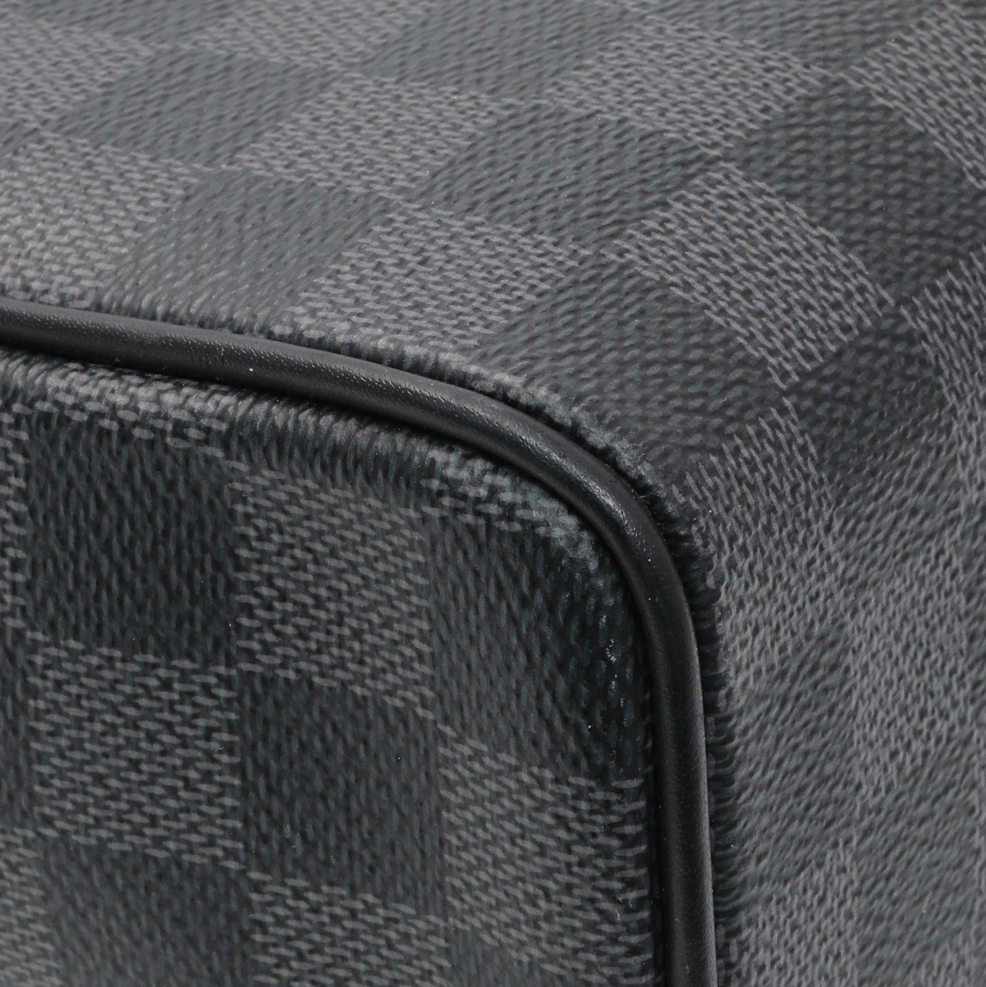 Exclusive Louis Vuitton Damier Graphite District Messenger — Lifestyle View