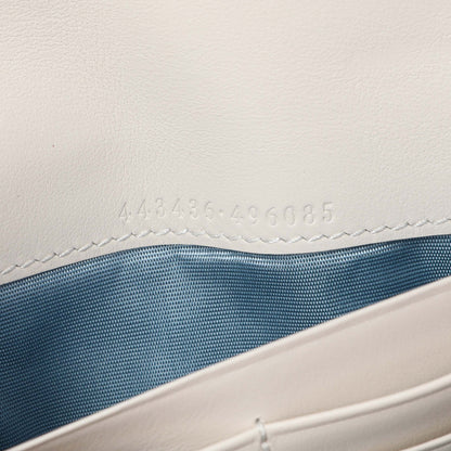 Exclusive Gucci Ivory Calfskin Monogram Matelasse Diagonal GG Apple Marmont Continental Wallet — Lifestyle View