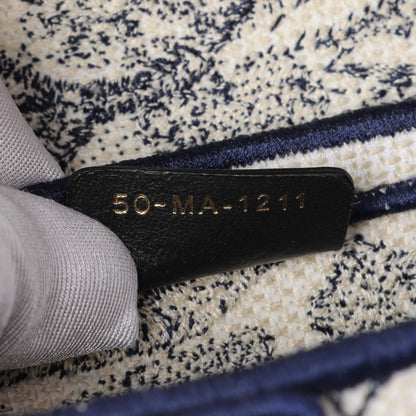 Exclusive Christian Dior Canvas Embroidered Saddle Bag — Lifestyle View