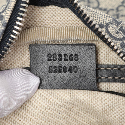 Exclusive Gucci GG Plus Monogram Messenger — Lifestyle View