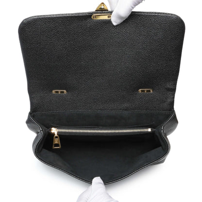 Exclusive Louis Vuitton Black Empreinte Monogram Giant Madeleine MM — Top View