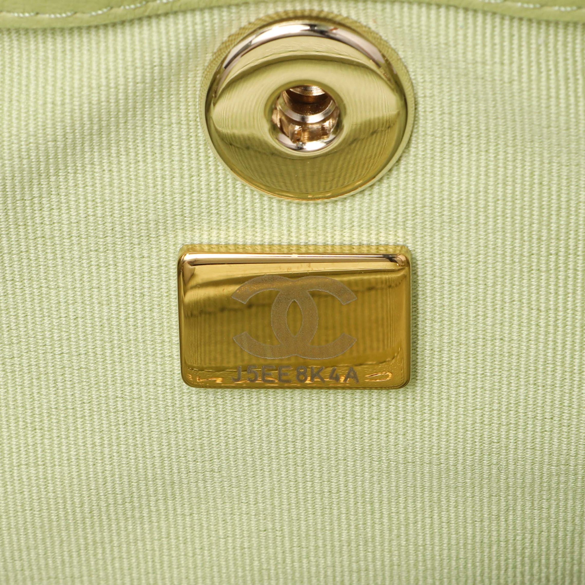 Exclusive Chanel Green Quilted Lambskin Small Duma Drawstring Backpack — Lifestyle View