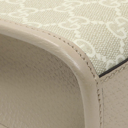 Exclusive Gucci GG Supreme Monogram Textured Dollar Calfskin Mini Retro Interlocking G Tote — Lifestyle View