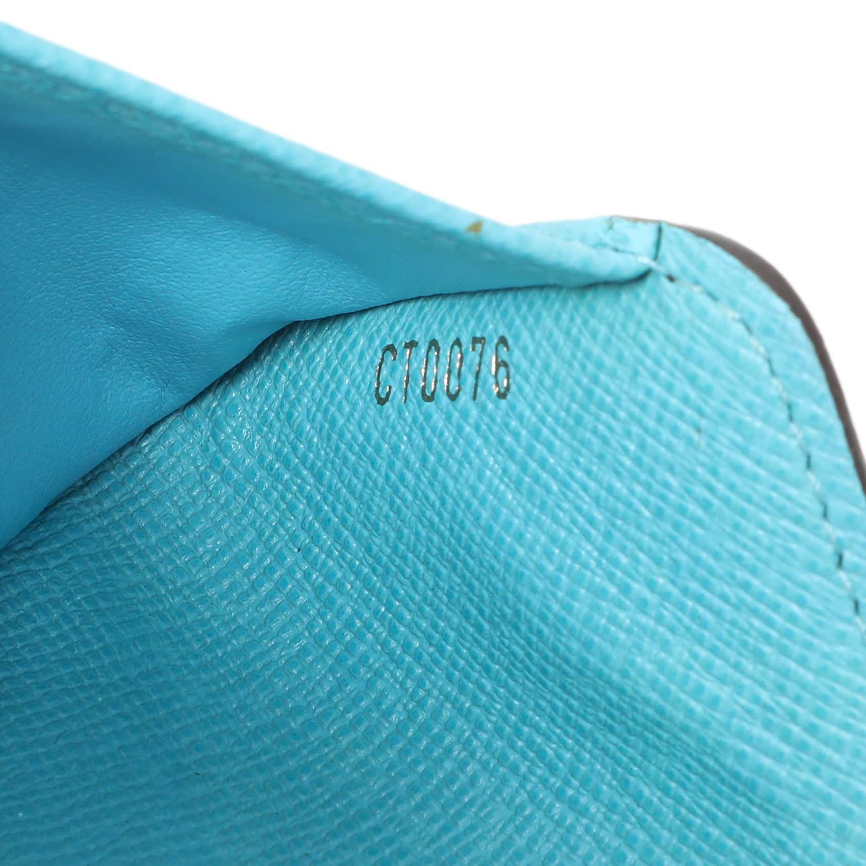 Exclusive Louis Vuitton Monogram Groom Compact Zip Wallet — Lifestyle View