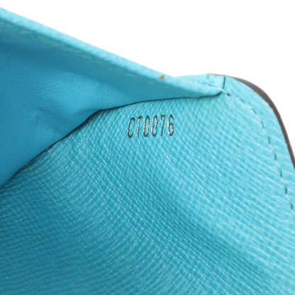 Exclusive Louis Vuitton Monogram Groom Compact Zip Wallet — Lifestyle View