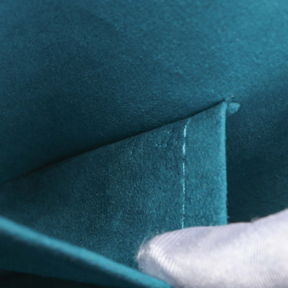 Exclusive Louis Vuitton Teal Epi Alma PM — Lifestyle View