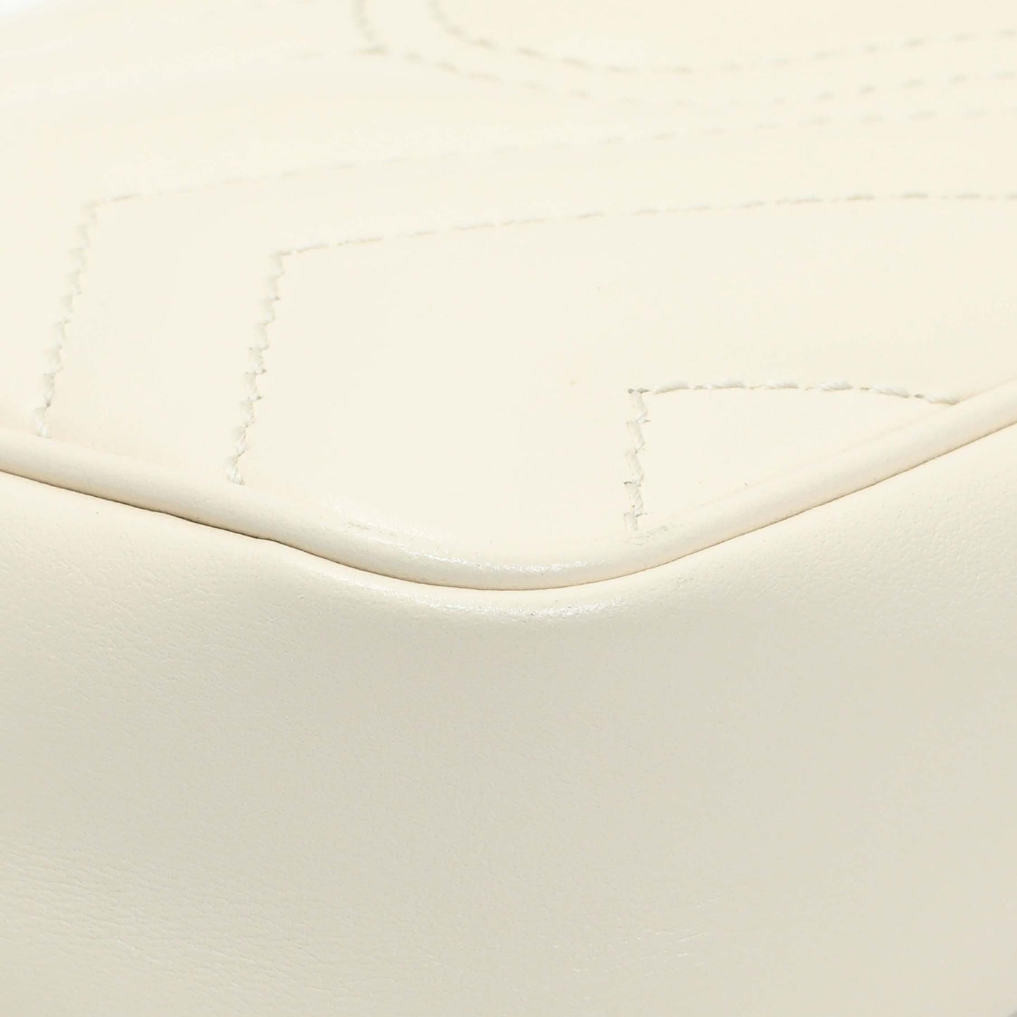 Exclusive Gucci White Calfskin Matelasse Super Mini GG Marmont Shoulder Bag — Lifestyle View