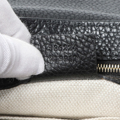 Exclusive Gucci Black Pebbled Calfskin Medium Soho Flap Crossbody — Lifestyle View