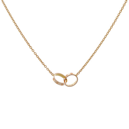 Exclusive Cartier 18K Rose Gold Interlocking Love Pendant — Side View