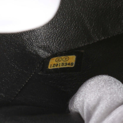 Exclusive Chanel Black Quilted Caviar Small Classic Double Flap — Lifestyle View