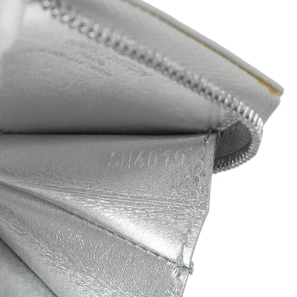 Exclusive Louis Vuitton Vernis Flocon Snowflake Coin Purse — Lifestyle View
