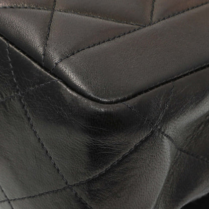 Exclusive Chanel Black Quilted Lambskin Vintage CC Chain Flap — Lifestyle View