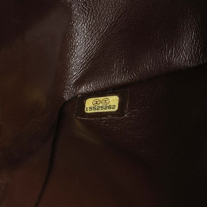 Exclusive Chanel Metallic Brown Quilted Patent 2.55 Reissue 226 — Lifestyle View