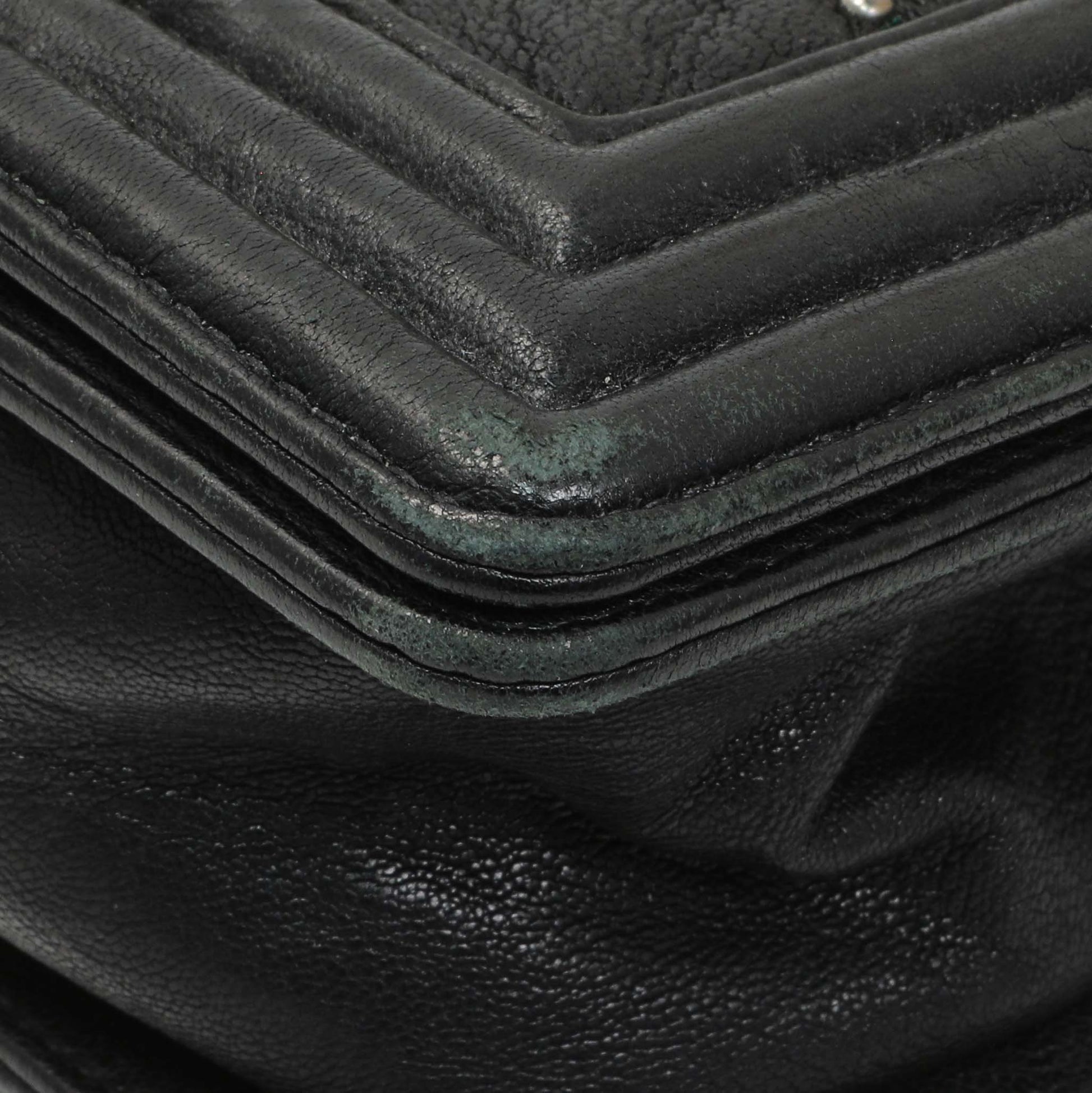 Exclusive Chanel Black Crumpled Lambskin Small Studded Boy Bag — Lifestyle View