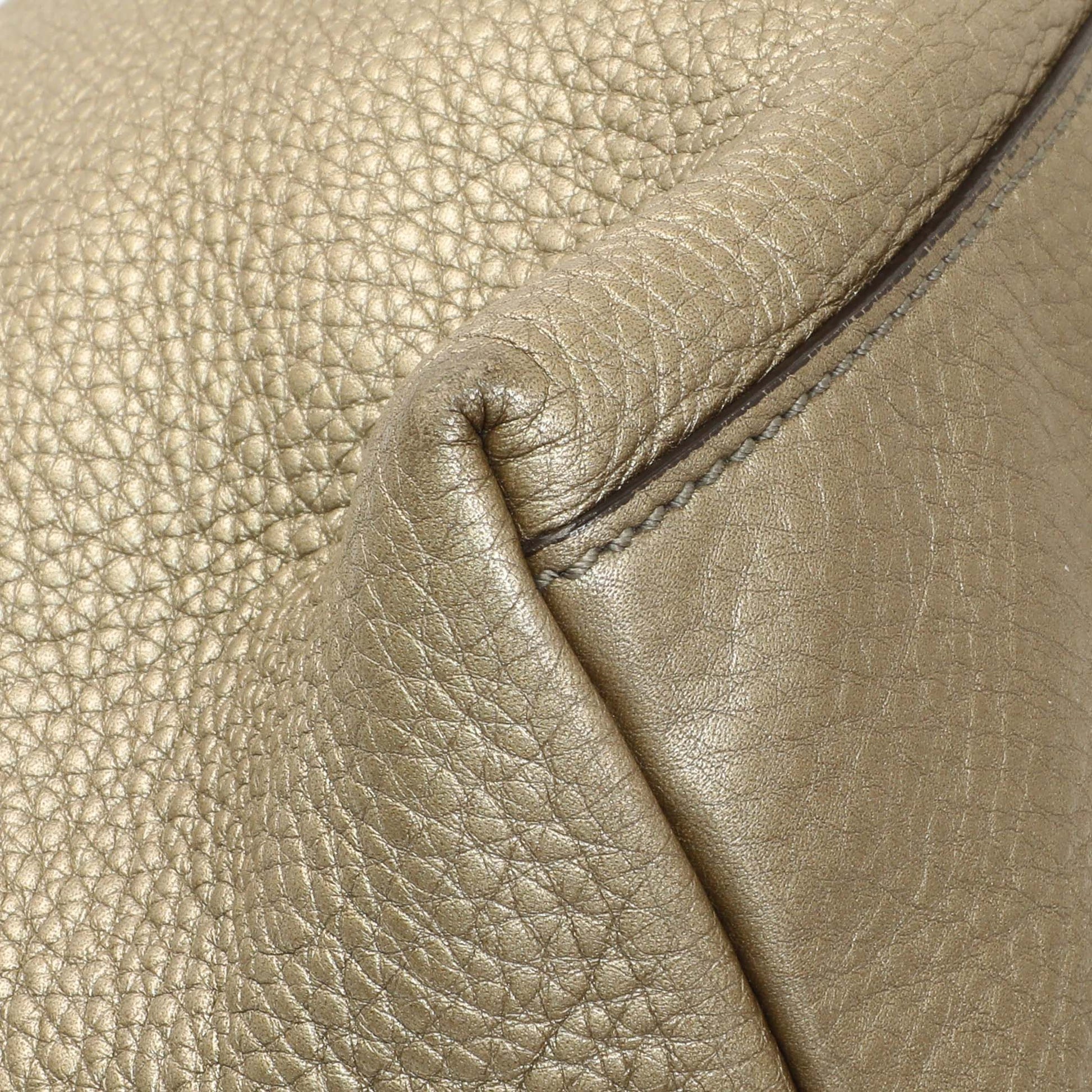 Exclusive Gucci Gold Pebbled Calfskin Medium Soho Chain Shoulder Bag — Lifestyle View
