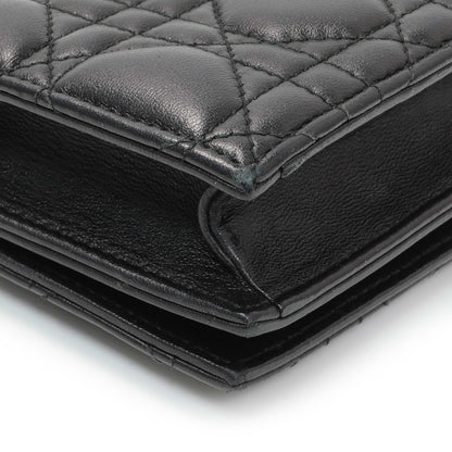 Exclusive Christian Dior Black Lambskin Cannage Lady Dior Convertible Clutch — Lifestyle View