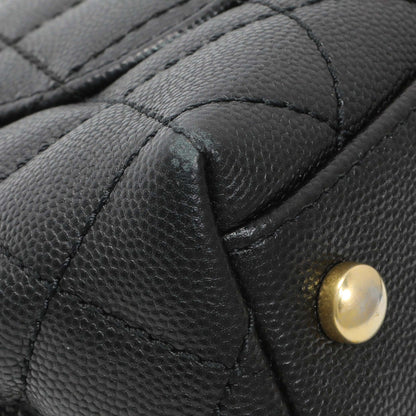 Exclusive Chanel Black Caviar Quilted Extra Mini Coco Handle — Lifestyle View