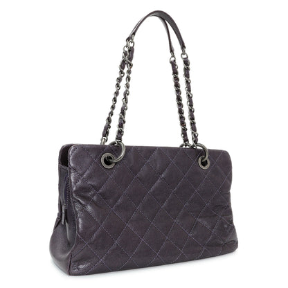 Exclusive Chanel Purple Iridescent Caviar Quilted Chic Shopping Tote — Side View