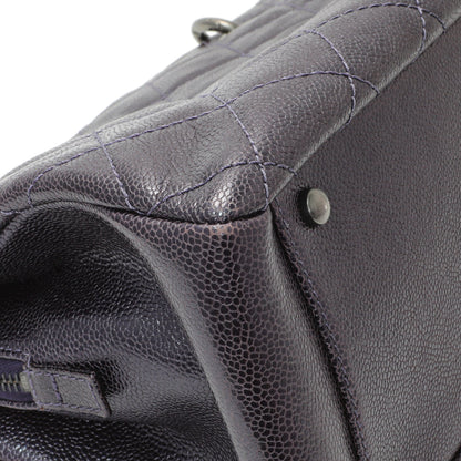 Exclusive Chanel Purple Iridescent Caviar Quilted Chic Shopping Tote — Lifestyle View
