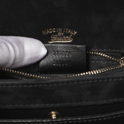 Exclusive Gucci Black Patent 1973 Top Handle Flap — Lifestyle View