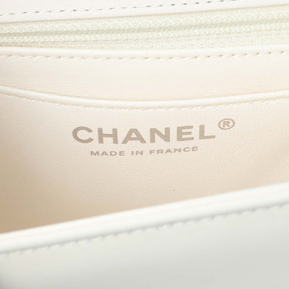 Exclusive Chanel White Patent Calfskin Small Camellia Flap — Lifestyle View