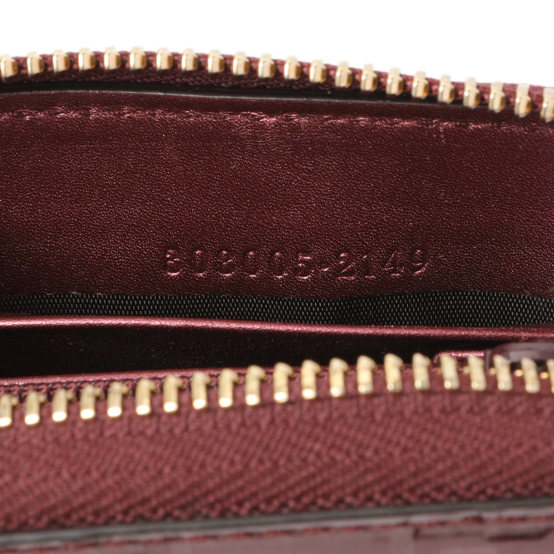 Exclusive Gucci Purple Shine Guccissima Zip Around Wallet — Lifestyle View