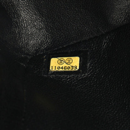 Exclusive Chanel Black Quilted Caviar Medium Classic Double Flap — Lifestyle View