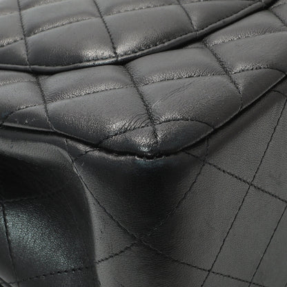 Exclusive Chanel Black Quilted Lambskin Jumbo Double Flap — Lifestyle View