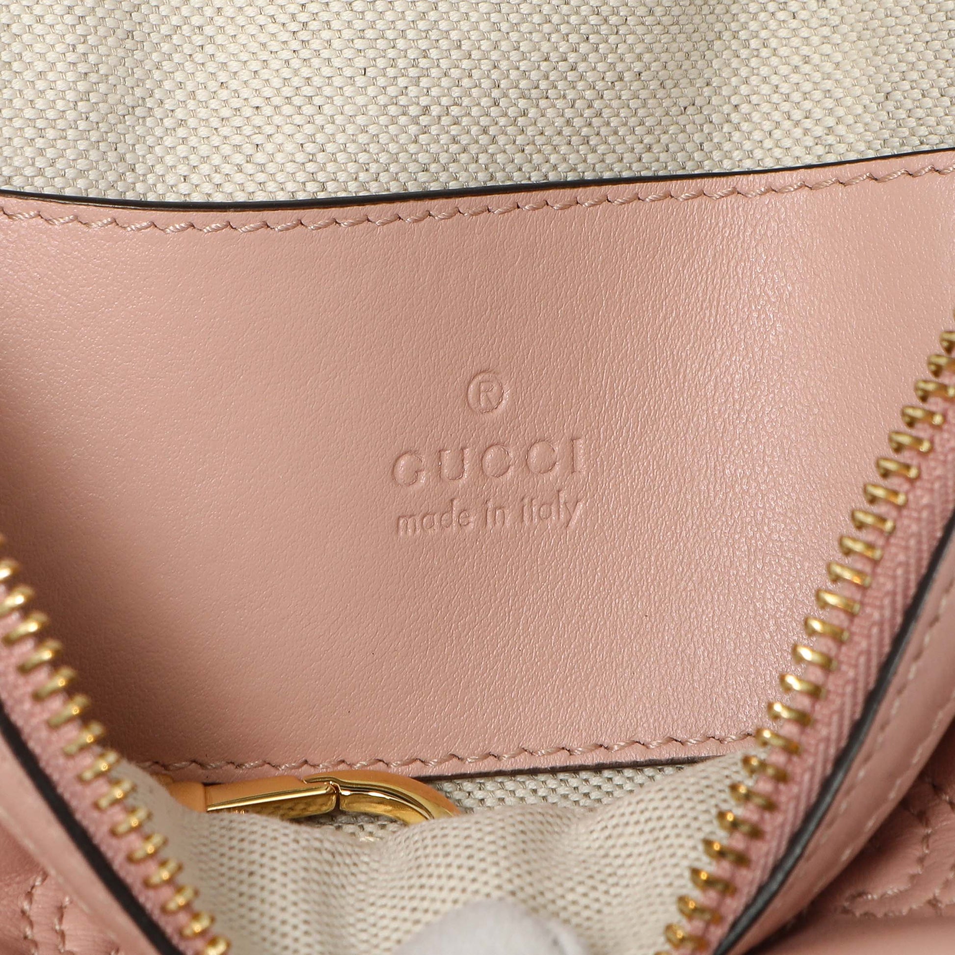 Exclusive Gucci Pink Calfskin GG Matelasse Top Handle Mini Bag — Lifestyle View