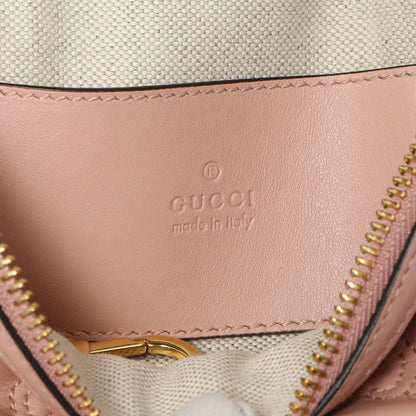Exclusive Gucci Pink Calfskin GG Matelasse Top Handle Mini Bag — Lifestyle View