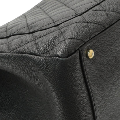 Exclusive Chanel Black Quilted Caviar XL Grand Shopping Tote GST — Lifestyle View