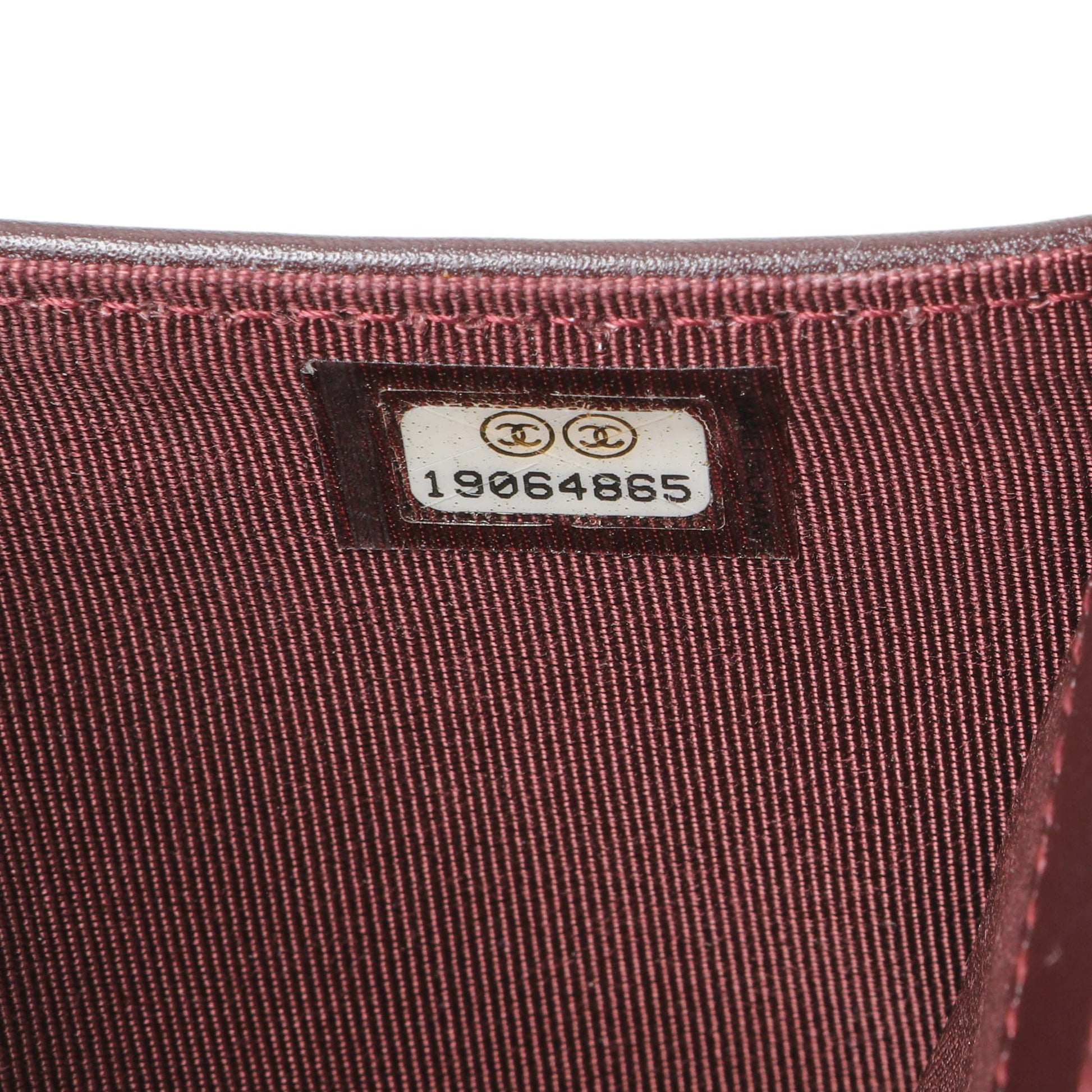 Exclusive Chanel Black Quilted Caviar Large Flap Wallet — Lifestyle View
