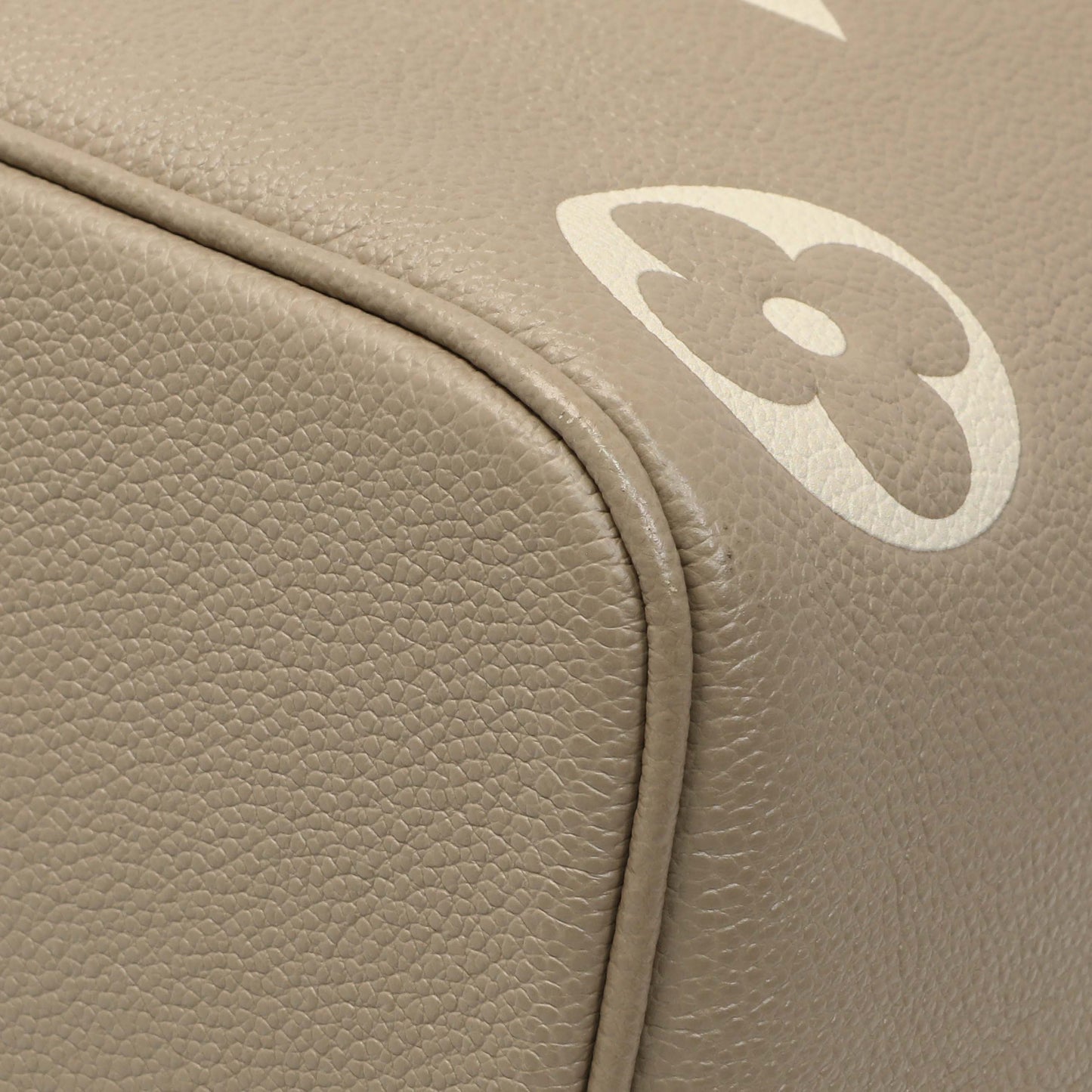 Exclusive Louis Vuitton Tourterelle Creme Empreinte Monogram Giant NeoNoe MM — Detail View