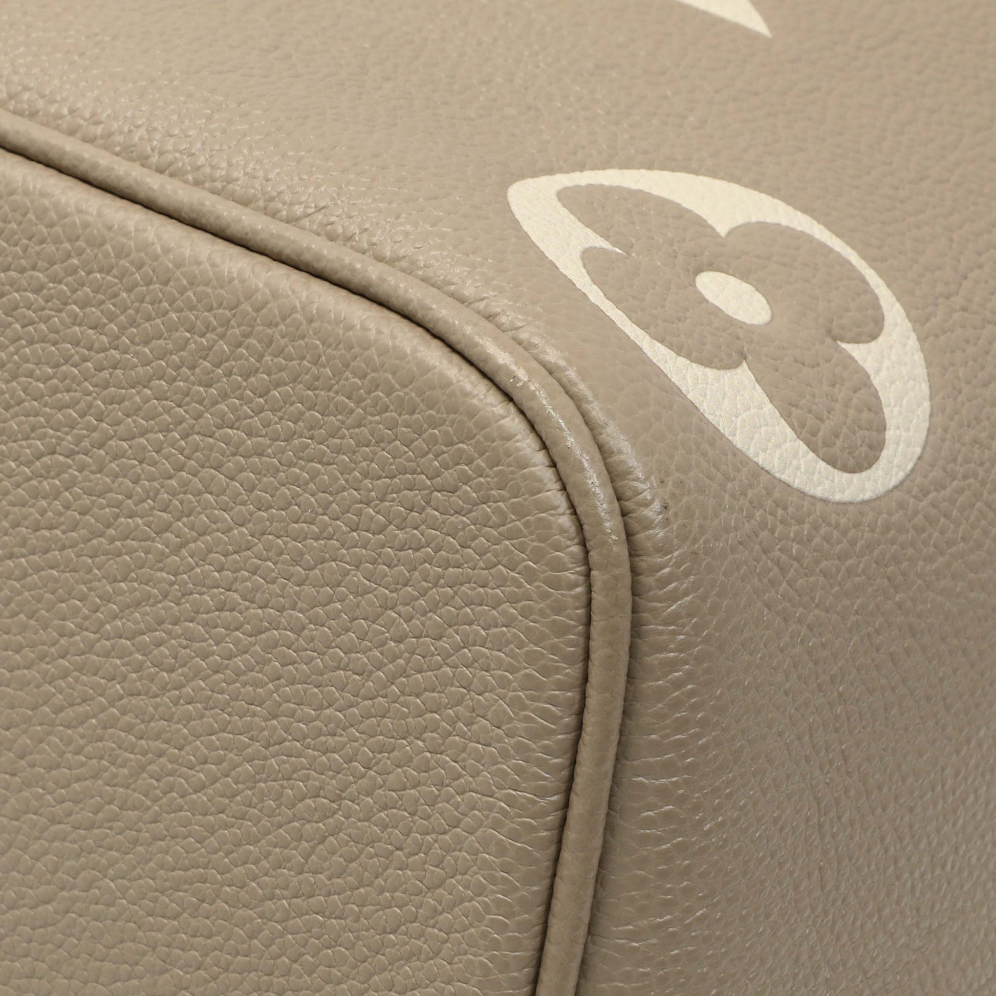 Exclusive Louis Vuitton Tourterelle Creme Empreinte Monogram Giant NeoNoe MM — Detail View