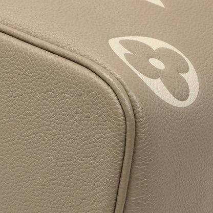 Exclusive Louis Vuitton Tourterelle Creme Empreinte Monogram Giant NeoNoe MM — Detail View