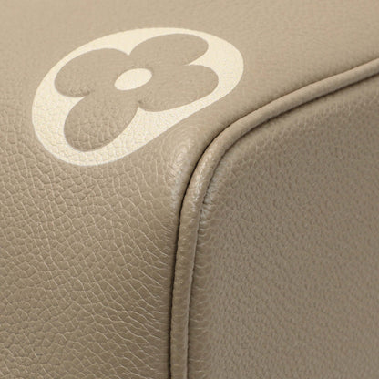 Exclusive Louis Vuitton Tourterelle Creme Empreinte Monogram Giant NeoNoe MM — Lifestyle View
