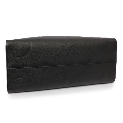 Exclusive Louis Vuitton Black Empreinte Monogram Giant Onthego MM — Back View