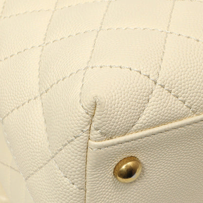 Exclusive Chanel White Quilted Caviar Medium Coco Handle — Lifestyle View