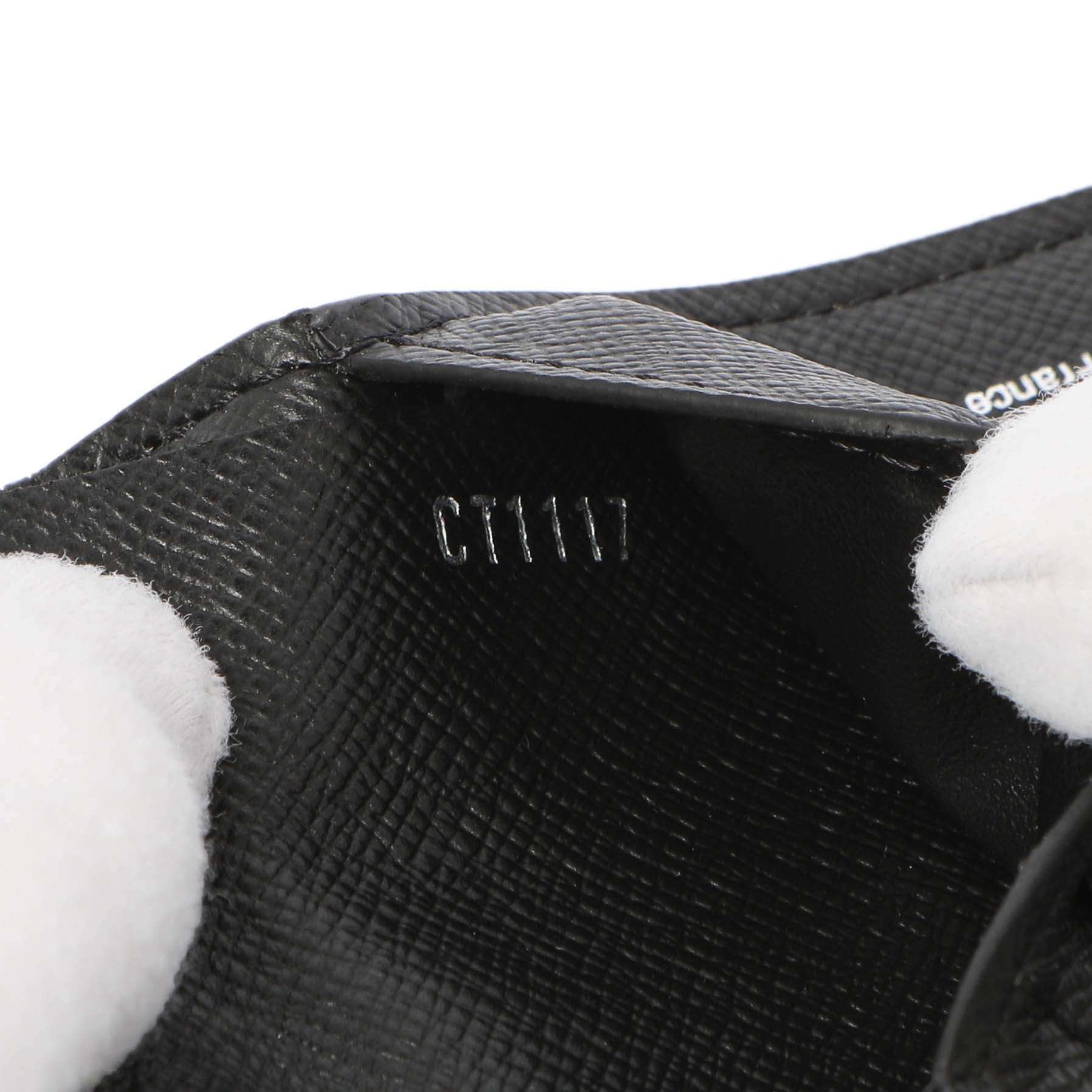 Exclusive Louis Vuitton Black Taiga Multiple Wallet — Lifestyle View