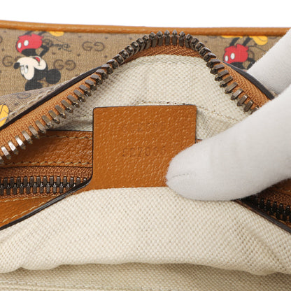 Exclusive Gucci X Disney Mini Vintage GG Supreme Monogram Mickey Mouse Belt Bag — Lifestyle View