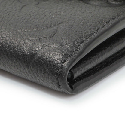 Exclusive Louis Vuitton Black Monogram Empreinte Sarah Wallet — Detail View