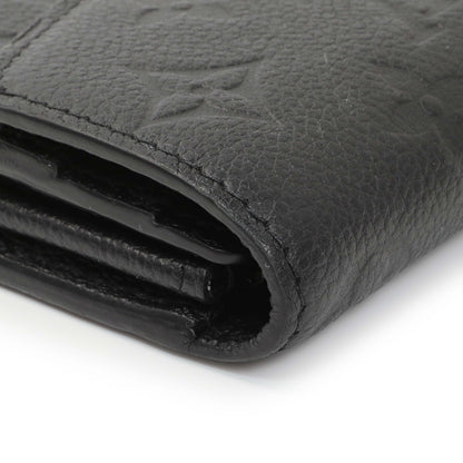 Exclusive Louis Vuitton Black Monogram Empreinte Sarah Wallet — Lifestyle View