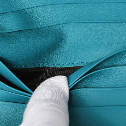 Exclusive Gucci Teal Microguccissima Compact Wallet — Lifestyle View