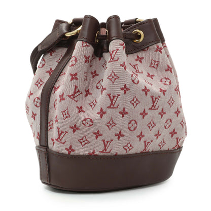 Exclusive Louis Vuitton Monogram Mini Lin Noelie Bucket Bag — Side View