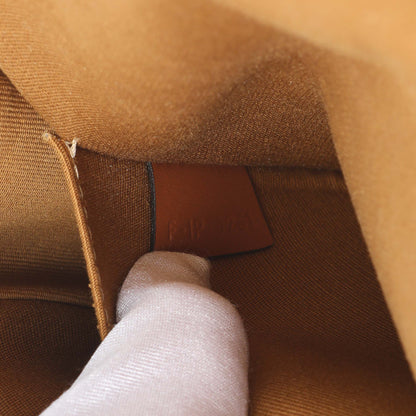 Exclusive Celine Tan Triomphe Canvas Medium Folco Bag — Lifestyle View