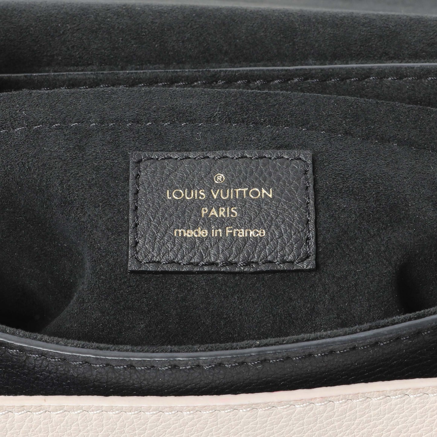 Exclusive Louis Vuitton Grained Calfskin Lockme Tender — Detail View
