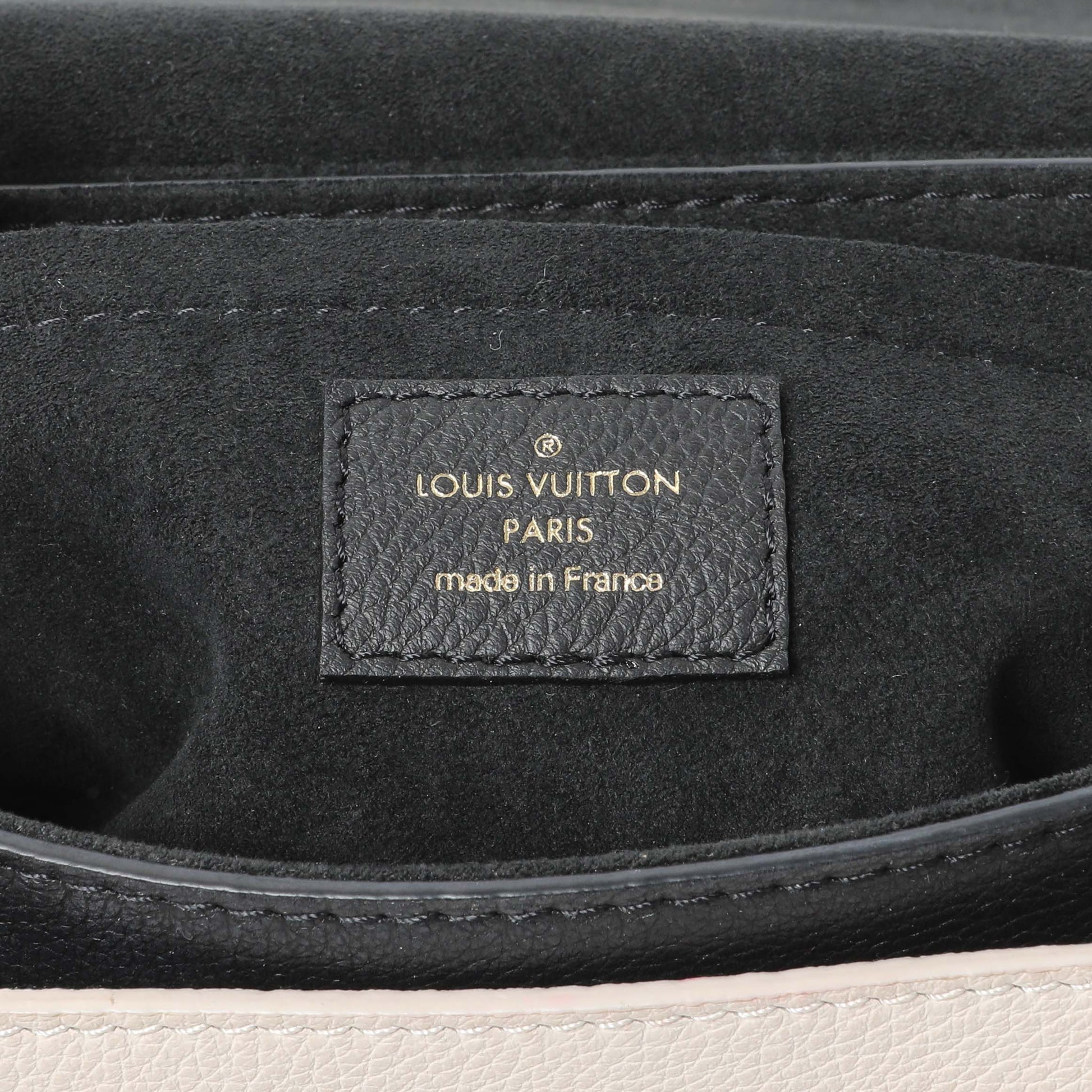 Exclusive Louis Vuitton Grained Calfskin Lockme Tender — Detail View