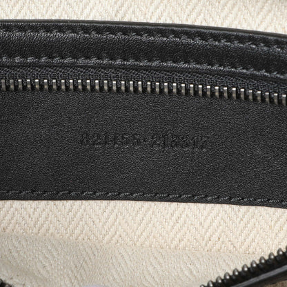 Exclusive Gucci GG Supreme Monogram Calfskin Emblem Small Crossbody — Lifestyle View